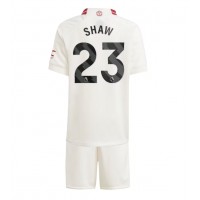 Camisa de time de futebol Manchester United Luke Shaw #23 Replicas 3º Equipamento Infantil 2023-24 Manga Curta (+ Calças curtas)